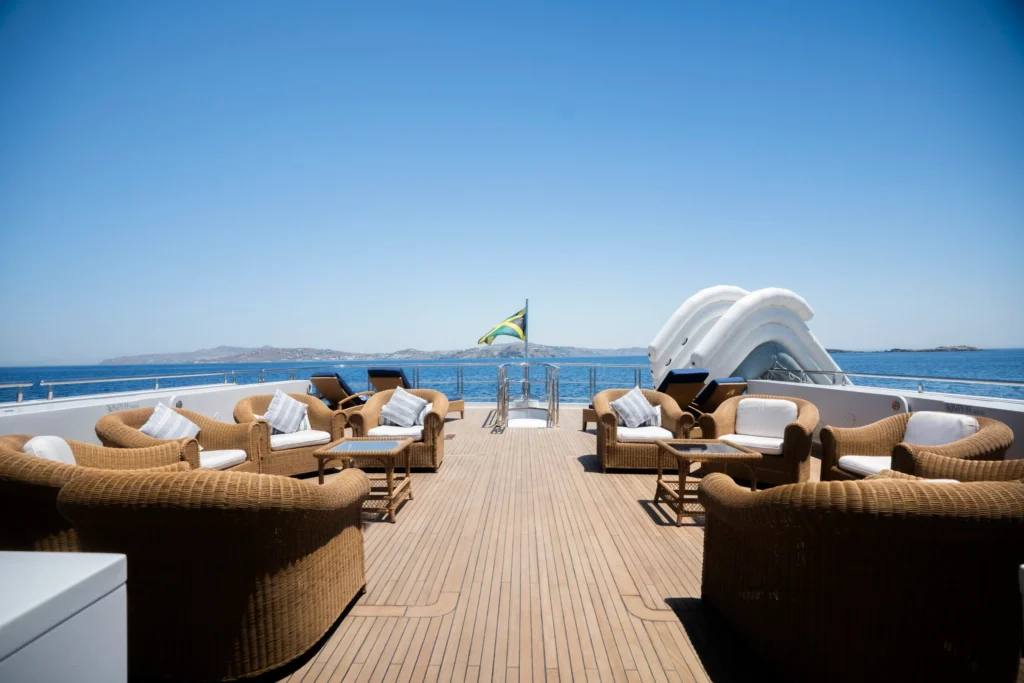 Seating area on Grace Yacht terrace with cozy arrangements and relaxing ambiance